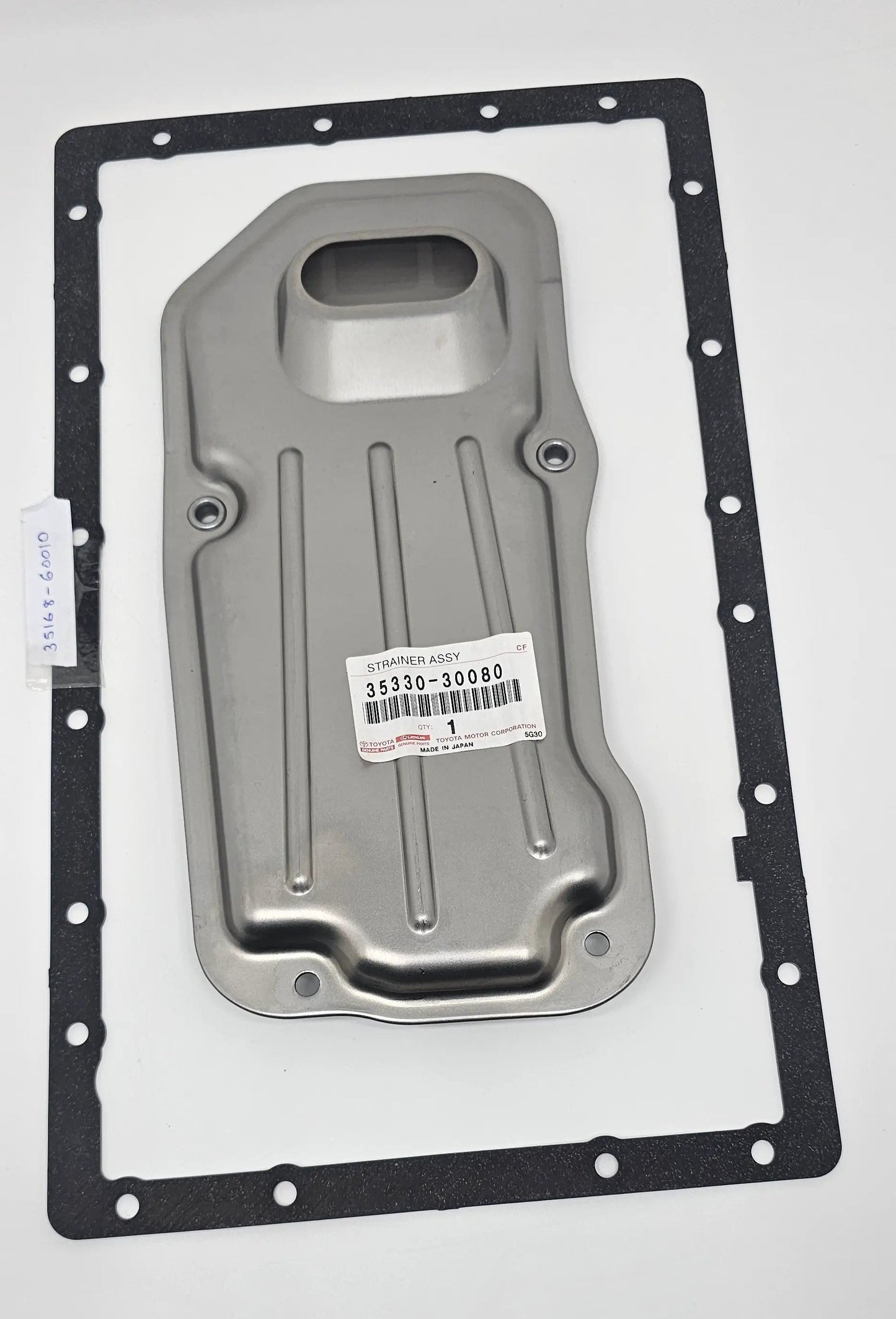 Toyota strainer assembly 35330-30080; gray metal housing with black gasket for engine oil circulation