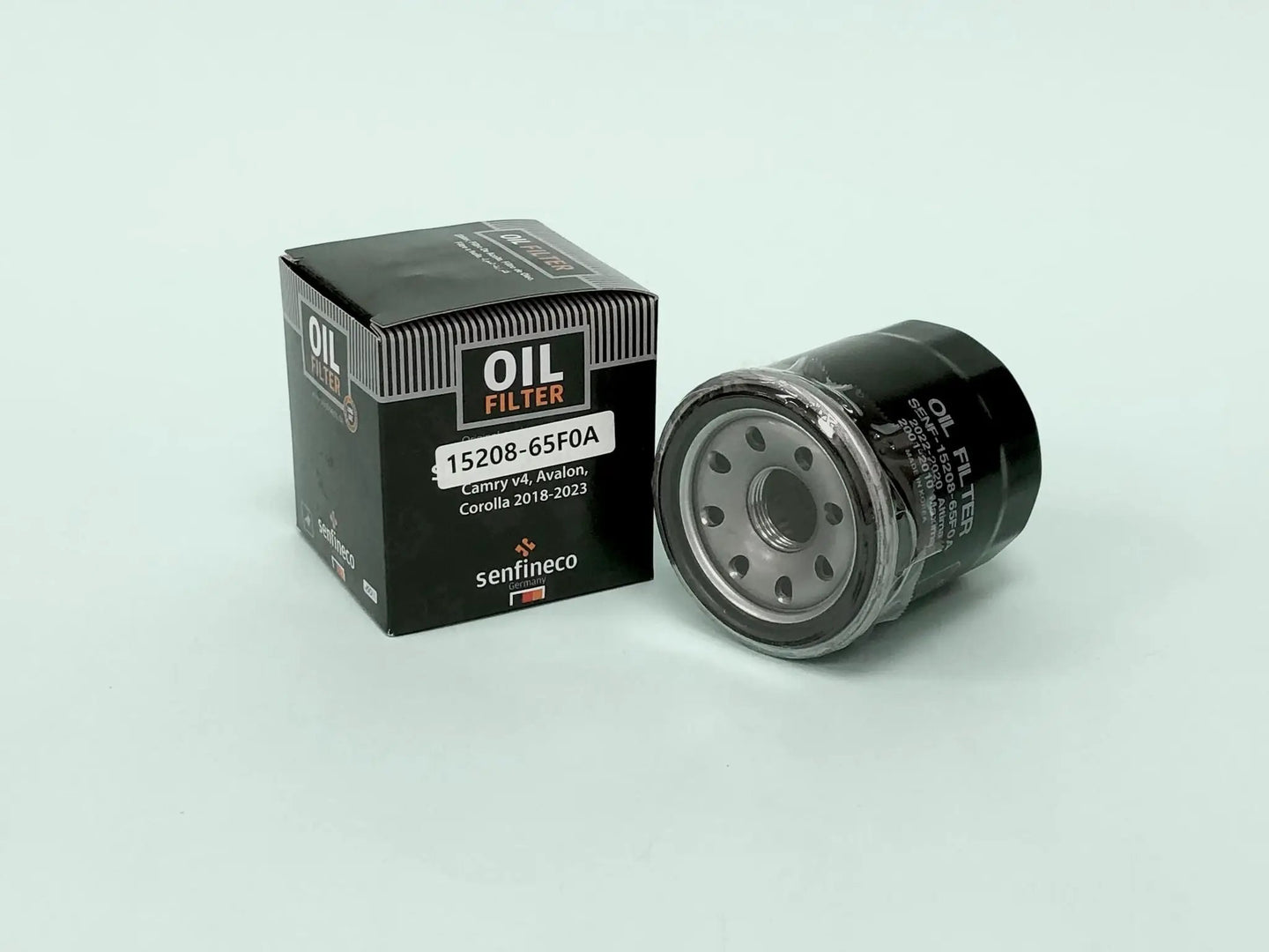SEN 15208-65F0A oil filter: box and canister, black packaging, Senfineco brand, 2 items