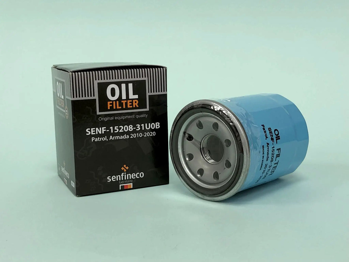 Oil filter pair: black Senfineco box (SENF-15208-31U0B) and blue canister filter.