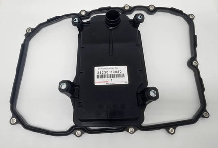 Oil strainer assembly 35330-60080 for Toyota Land Cruiser LX570; black plastic housing with gasket