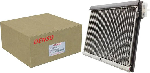 Denso AC evaporator core with box; silver finned unit (2 items shown)