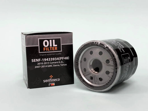 Oil filters (2) by Senfineco; black box labeled OIL FILTER PF48 beside a grey metal canister