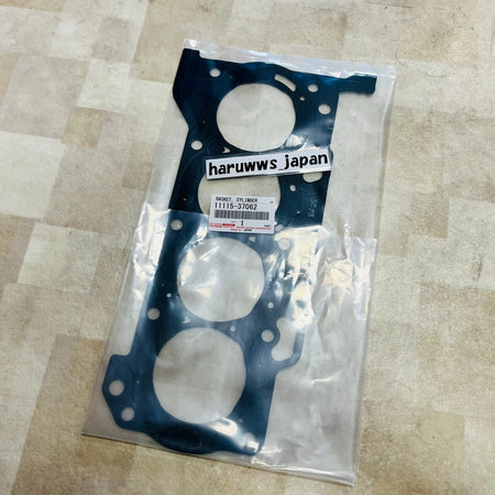 Genuine Toyota cylinder head gasket 11115-37062 in original packaging with label